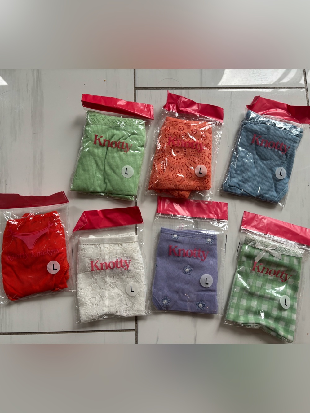 Knotty Knickers lot of 7 pairs size Large panties. Never opened.